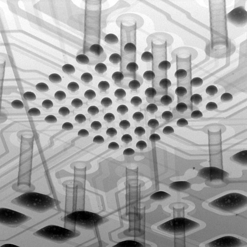 Figure 7. The board after the application of solderpaste. Notice the tiny microvias below the pads and how much larger the ‘regular’ vias are.