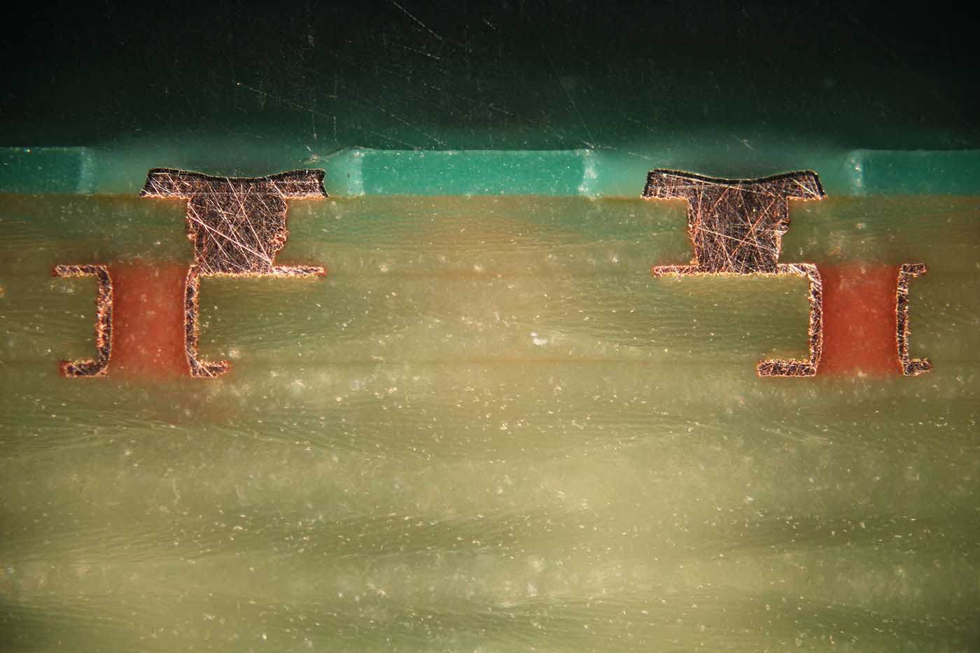 Microsection of 100 µm staggered microvias